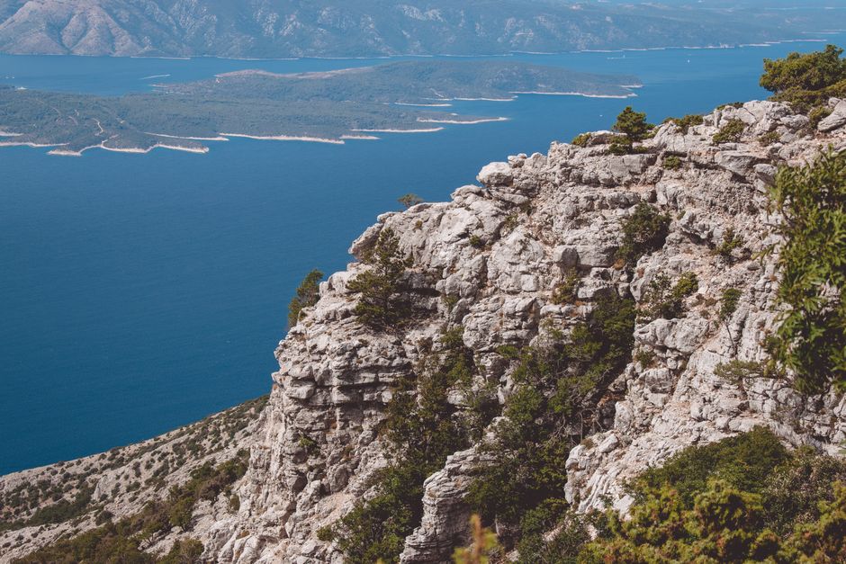 Rocky cliffs and azure sea in Bol Croatia