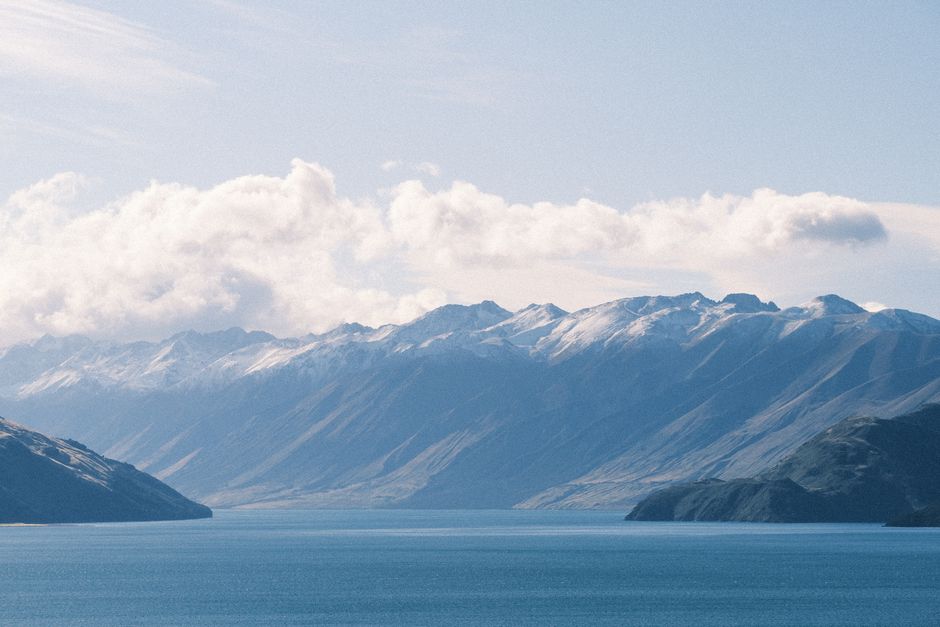 Snow-capped mountains and lake in New Zealand