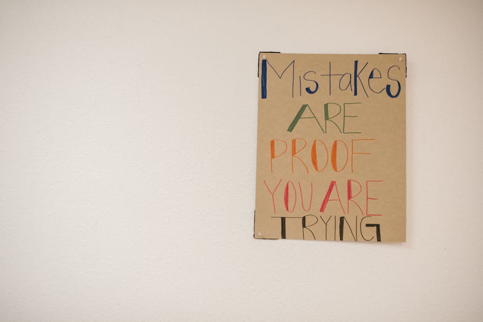 A motivational poster with the phrase 'Mistakes are proof you are trying.'