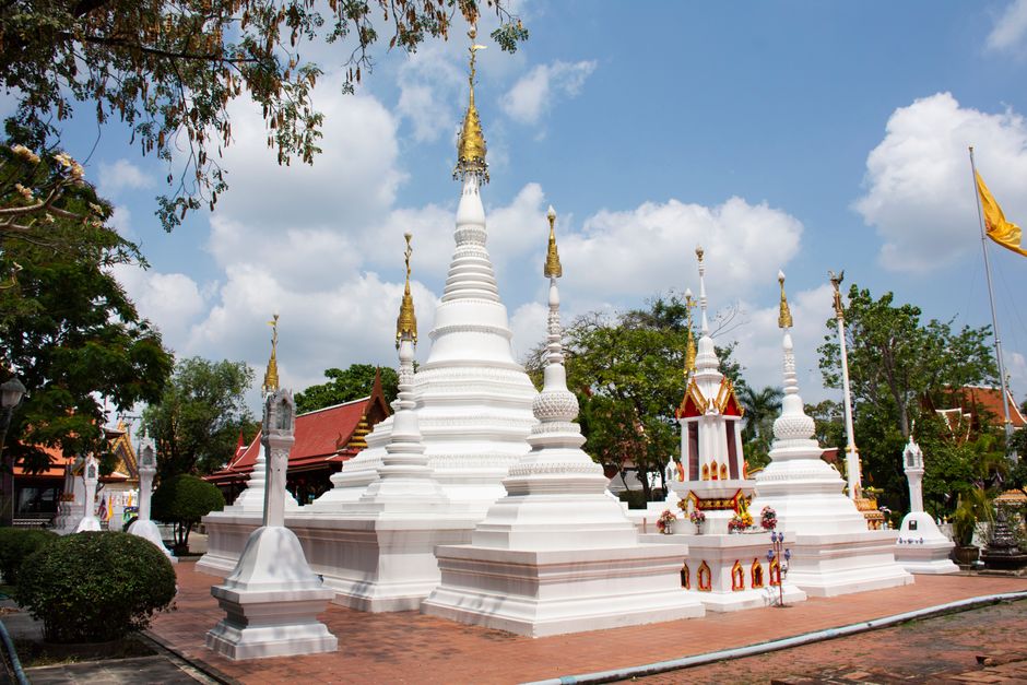 White stupas at Wat Chomphuwek temple Thailand